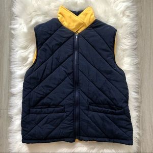 Northern Reflections reversible puffer vest blue and yellow